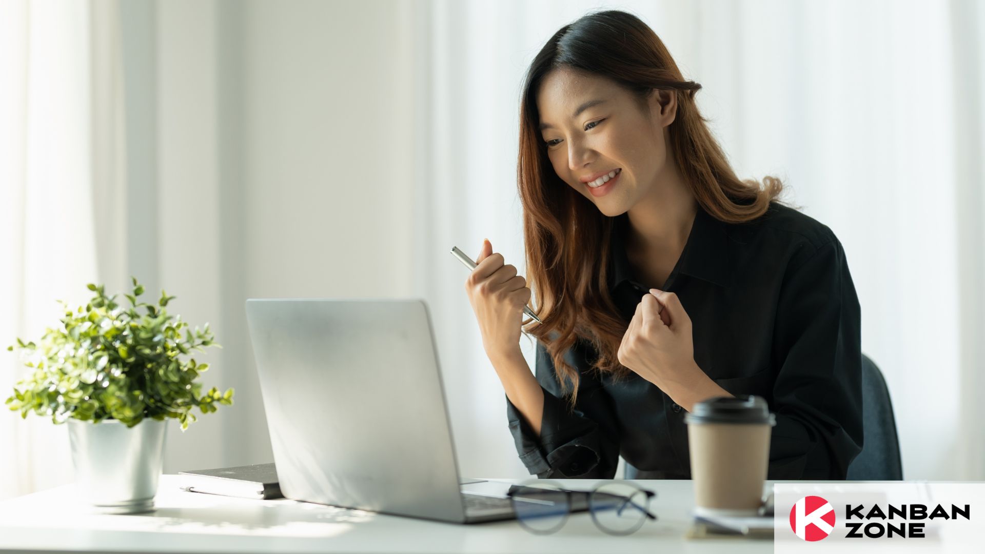 Young woman celebrating success