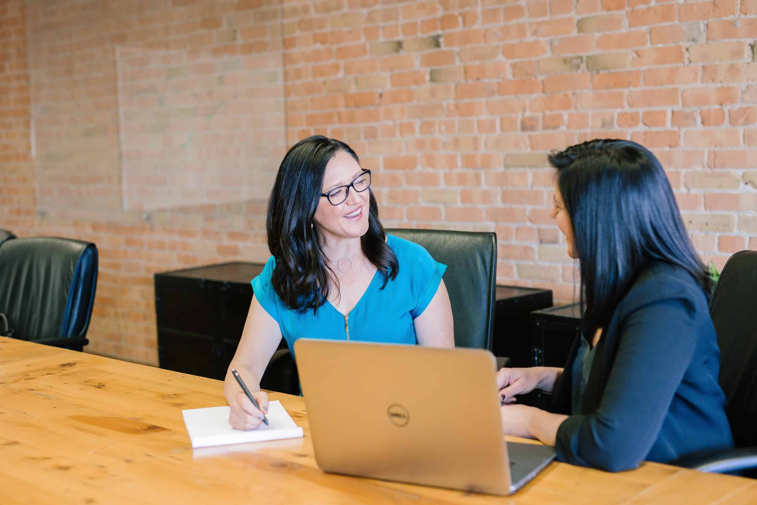 two working women talking