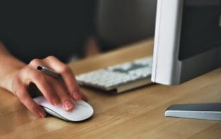 woman in front of a computer